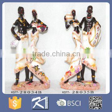 interior decorative black man woman statues