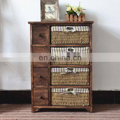 4 tier Tall wood cabinet with many drawers with rattan basket