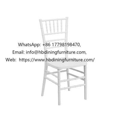 White one-piece curved plastic Tiffany dining chair