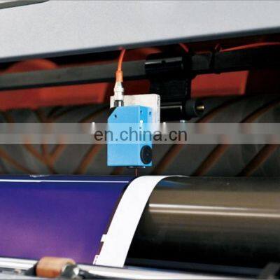 UCM1400A Automatic Kraft Jumbo Printed Paper Roll to Sheet Cutting Machine Guillotine Reel Cross Cutter photo-3