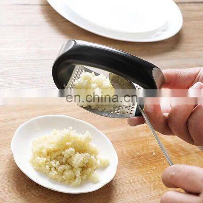 Hot Sale Professional Kitchen Gadgets 2022 Plastic Stainless Steel Rocker Mincer Crusher Garlic Too Press Chopper and Roller photo-3