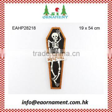 Halloween wall hanging of skull in coffin