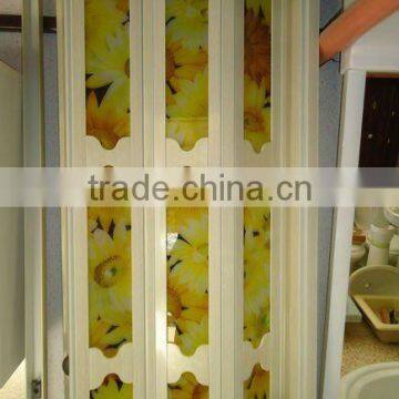 PVC folding door with flower glass