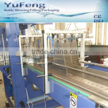 Automatic film wrap shrink wrapping machine