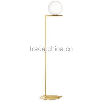 0705-5 Brassed or chromed steel, blown glass opal diffuser balance on the edge of a rod floor lamp