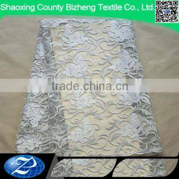 White elegant french embroidery design neaded net lace fabric for wedding dress                        
                                                                                Supplier's Choice