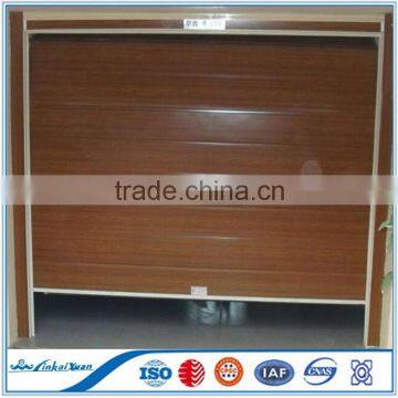 Wooden grain Garage Position cheap garage door Wuxi factory/sectional garage door