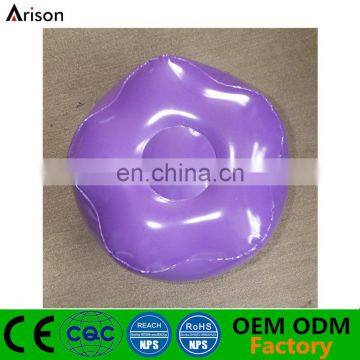 Inflatable flower shaped cushion for booster seat