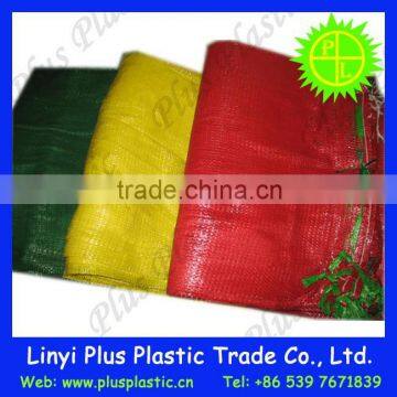 Plastic mesh bag for packaging vegetables, firewood for sale