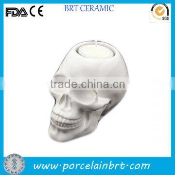 White ceramic skull candle holder for Hallowmas