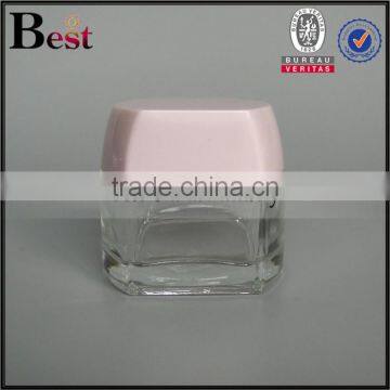 China Cosmetics 50 ml Glass Jar Clear Transparent Square Glass Jar With Pink Cap Manufacture photo-2
