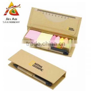 notepad with ruler and pen