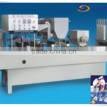 Automatic filling and sealing machine