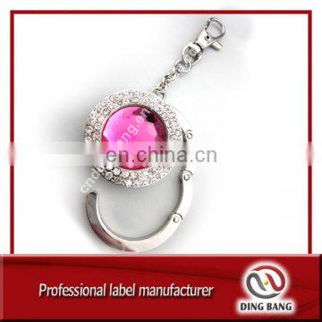 Wholesale Promotion Cheap Items Pink Acrylic Type Custom Blank /Laser Logo Metal Souvenir Foldable Bag Hanger