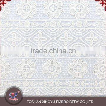 Hot sale promotional cheap cutwork lace embroidery designs african net lace fabric netting stretch mesh