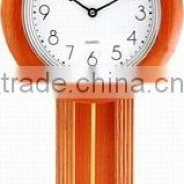 Glass wooden pendulum wall clock