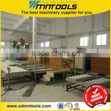 Wood sandwich board laminating line