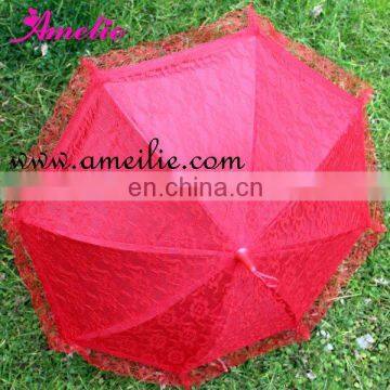 Small red doll umbrellas