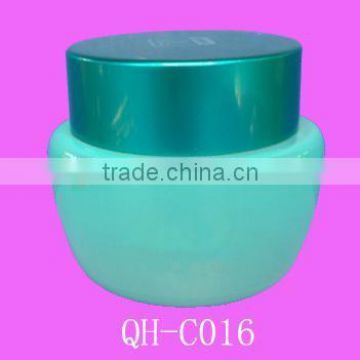 frosted glass face cream jar with green cap