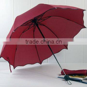 lotus leaf lady folding umbrella