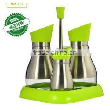 Glass oil vinegar spice cruet set with metal coating and stand