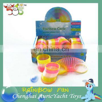 hot toys for christmas 2013,plastic rocking toys for kids,kids spring toys,neon color rainbow circle spring ZH0906817