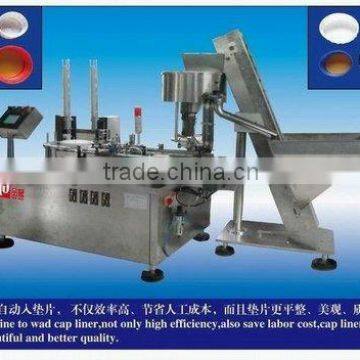 Aluminum foil cap lining machine