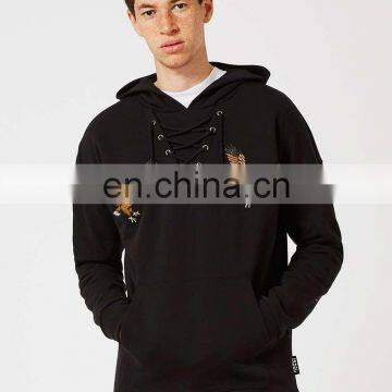 Black embroidered lace up neck and kangaroo pocket hoodie