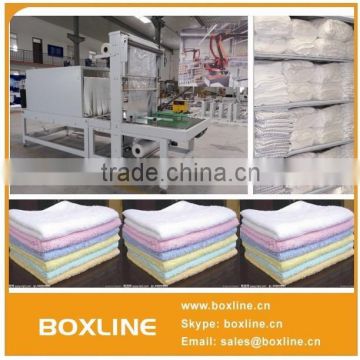 Automatic bed sheet packing machine with PVC shrink