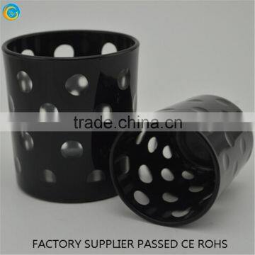 Black and white series of sprayed votive candle holders