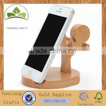 Kungfu boy shape wooden phone holder