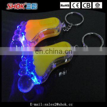 Souvenir foot flashing led keychain