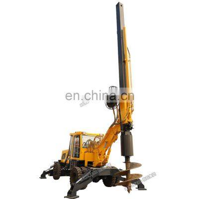 Large hole drilling wheeled rotary screw pile driver