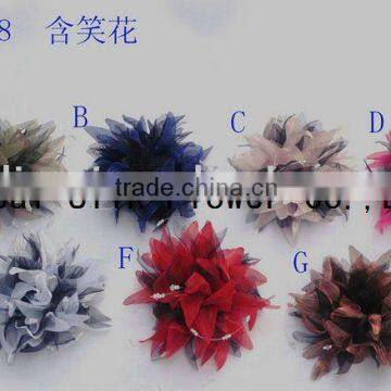 artificial silk flowers as clothes brooches