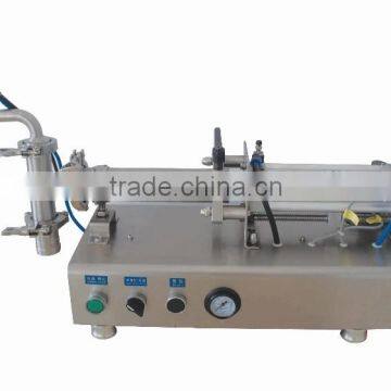 Table top filling machine for liquid