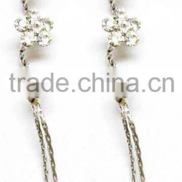 Fashion earring with bend shaped strio and two stones on end