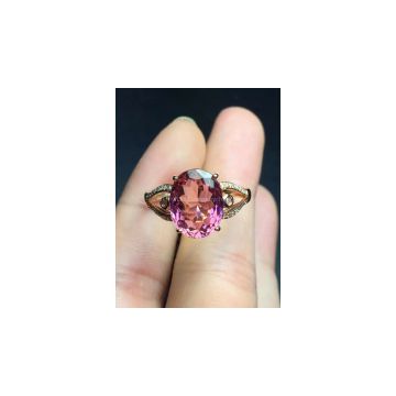 Fashion natural pink tourmalines 18k gold ring set with diamonds.