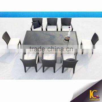 New arrival restaurant patio furniture 8 seater rattan chairs and wicker glass dining table                        
                                                                                Supplier's Choice