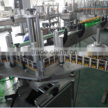 Automatic sticker labeling machine for round bottles