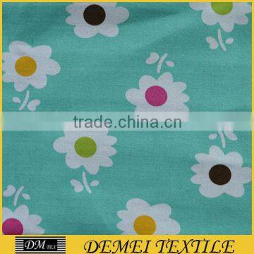 woven pattern print poly cotton blue fabric flowers