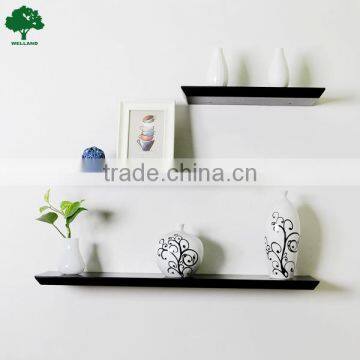 Designed trapezoid wall shelf in black