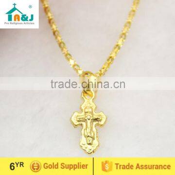 Gold color cross pendant