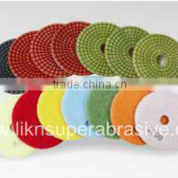 Wet polishing pads with QRS