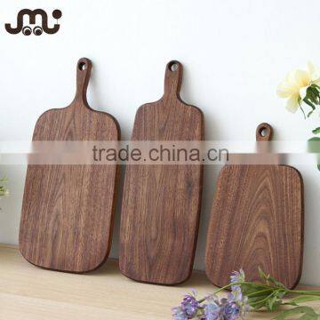 Natural waxed walnut wooden cutting board