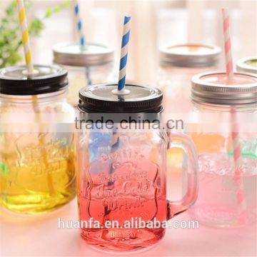 Hot selling products of glass drink pump lid 480ml colorful glass mason jar with handles wholesale