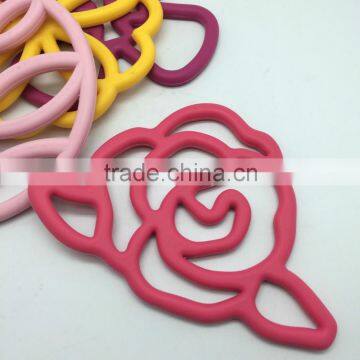 iron pot holder nice sitting on table delicated trivet in rose shape