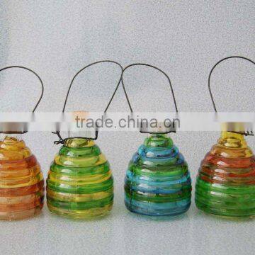 colored glass wasp bottle