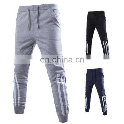 Customized wholesale men's jogging harness pants solid color elastic harem pants