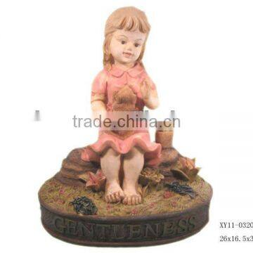 Resin girl with dog statue