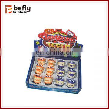 Mini Plastic Wind up Jump Teeth